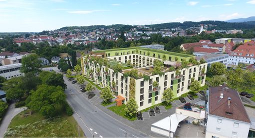 Bild 2 Architektonisch gruppieren sich die vier Vollgeschosse um ein begrüntes Atrium. Dieses bildet das Herzstück der Anlage: ein geschützter Innenhof, der gleichermaßen Rückzugsort und sozialer Treffpunkt ist. (Quelle: Schlagmann Poroton)